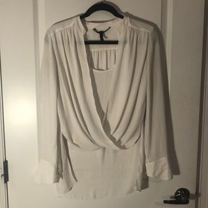 BCBG whit high low blouse.